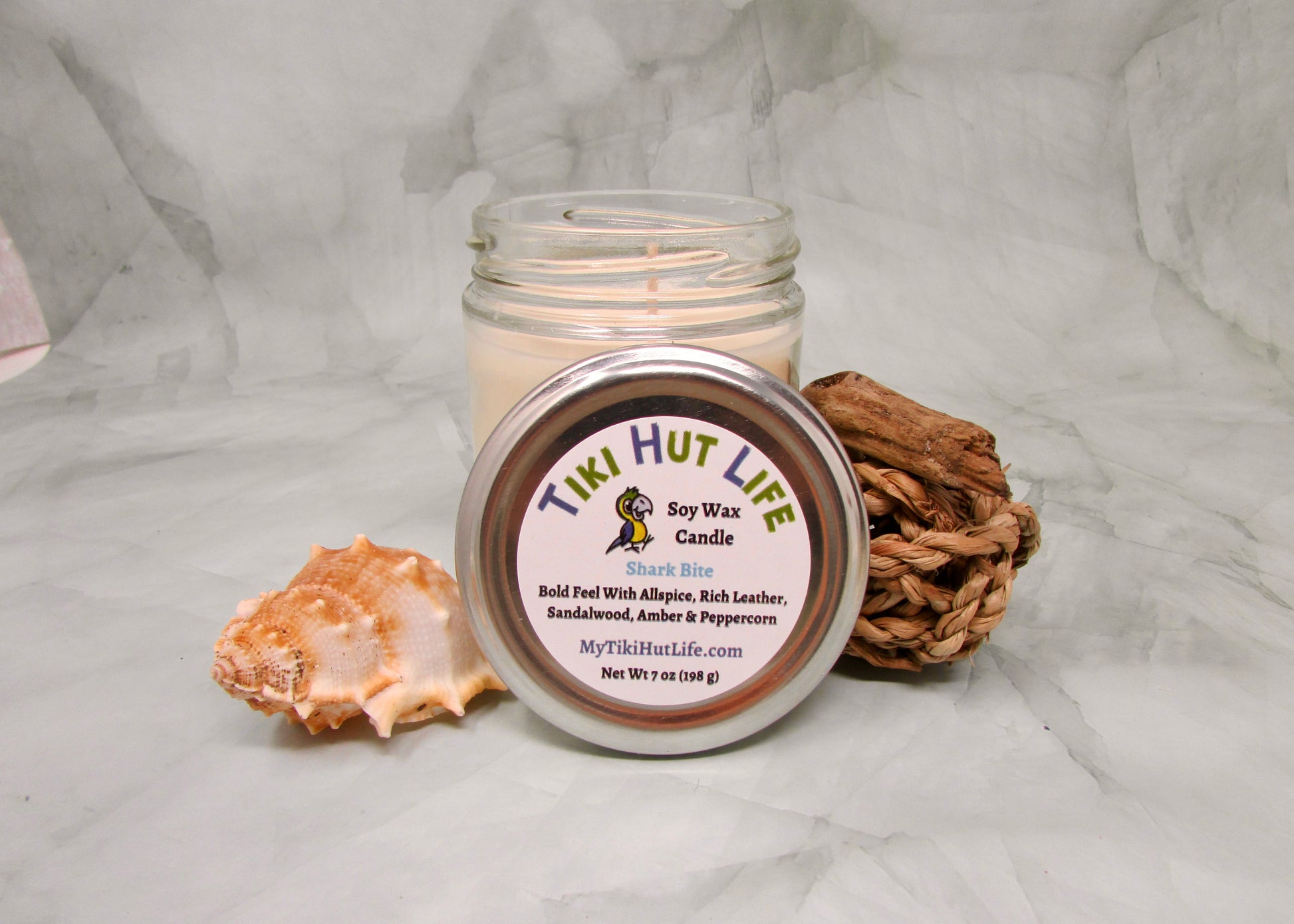 Caribbean feel with allspice, rich leather, tobacco leaf, and clove. A deep base of sandalwood, amber, and peppercorn creates a bold, spicy, and woody aroma.   Soy wax candle.   Net Wt 7 oz (198 g)